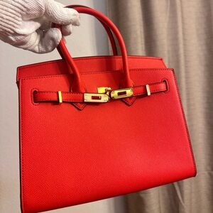 Red Top Handle Leather Handbag with gold hardware